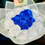 15 count satin blue and white rose bouquet