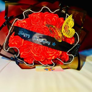 happy-birthday-banner-red-satin-rose-butterfly-black-and-white-pearl-wrap-tiny-black-bows